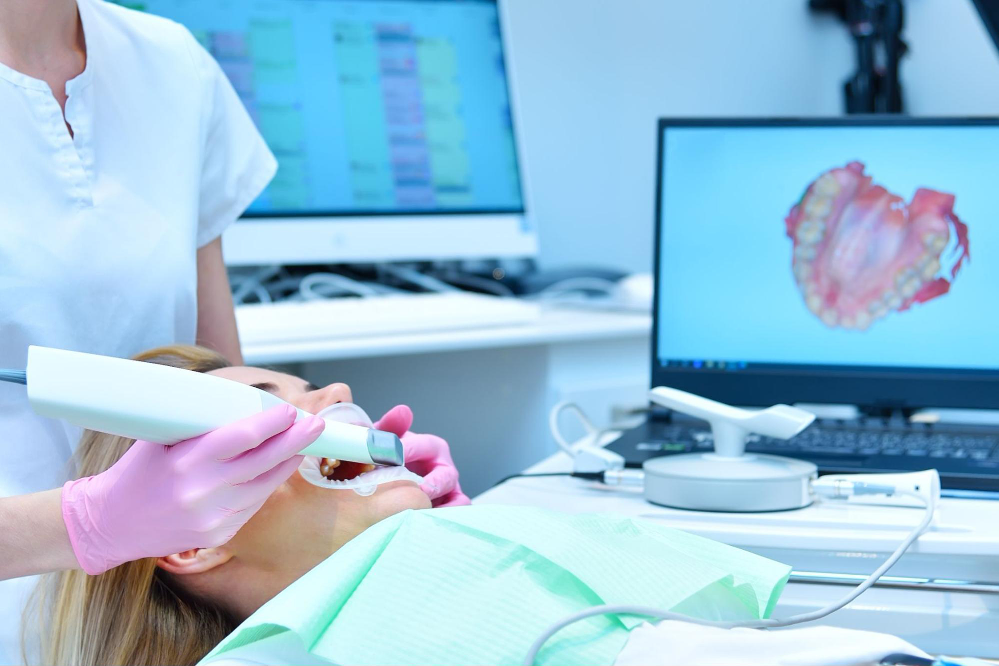 An intraoral scanner is used to create a highly accurate 3D model of the patient’s teeth and supporting structures